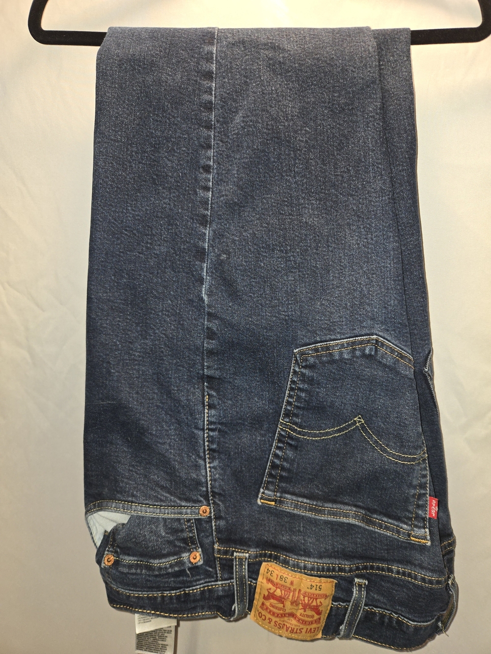 Levi's Dark Blue Denim Jeans with Yellow Stitching and Red Tab